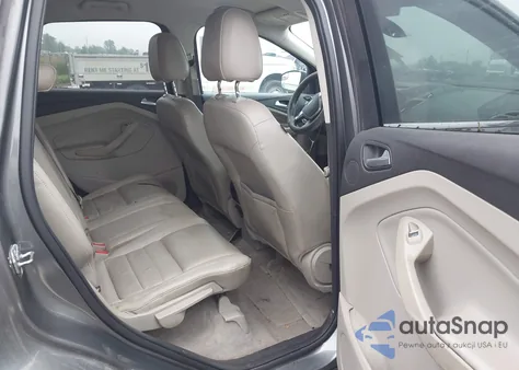 2014 Ford Escape Titanium z USA, uszkodzony, nr VIN 1FMCU9J94EUD53193